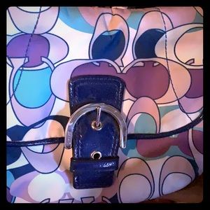 Blue black and purple coach mini backpack